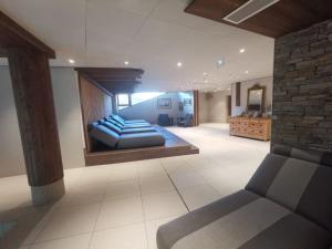 Appartements Esprit chalet cote pistes Le Snoroc C36 : photos des chambres