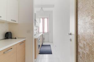 GuestHost - MM Lotto - Comfy & Bright Apartment X4