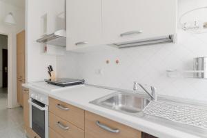 GuestHost - MM Lotto - Comfy & Bright Apartment X4