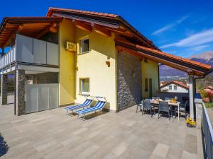 Rose Gialla Pastella Terrassen Ferienwohnung OG