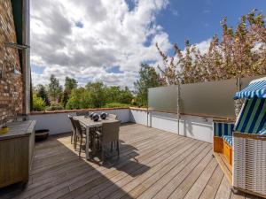 Ferienhaus-Ruegenbrise-mit-Seeblick-und-5-Baedern