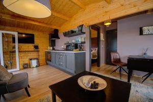 Luxury Log Cabin with Private Hot Tub & Sea Views