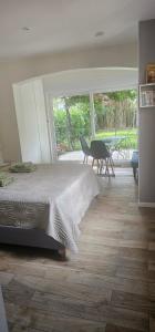 Appartements Studio avec terrasse et tonnelle : photos des chambres