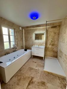 Appartements la vallee du paradis studio avec balneotherapie en campagne : photos des chambres