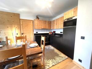 Appartements Esprit chalet cote pistes Le Snoroc C36 : photos des chambres