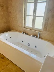 Appartements la vallee du paradis studio avec balneotherapie en campagne : photos des chambres