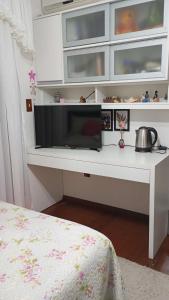 Quarto familiar na cidade do Cristo