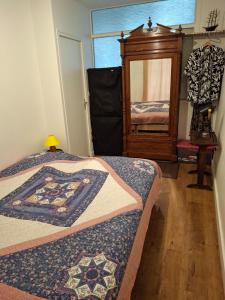 Appartements LA PORTE BLEUE : photos des chambres