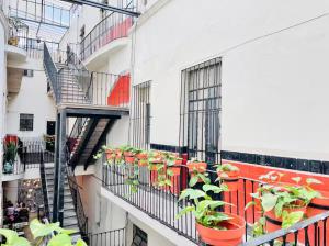 Departamento #7 frente al Zócalo de Puebla en casona del siglo XVI