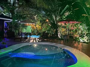 7 bedrooms with pools, jungle around and 200 meters to the beach!