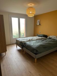 Appartements Maison avec jardin proche du marche : photos des chambres
