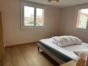 Maison avec jardin proche du marché