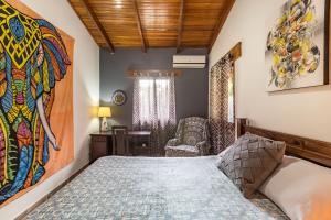 Intimate Earthy Vibe - Bedroom in a Tropical Paradise