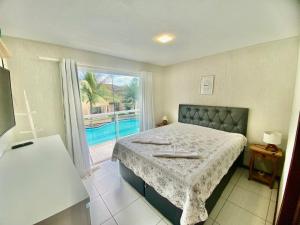 Casa com piscina em condomínio na Rasa