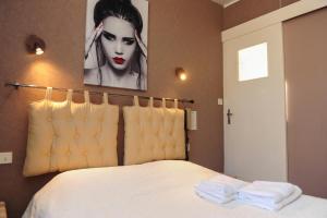 Hotels Logis Le Franco Belge : photos des chambres