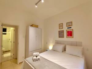 Moderno e Aconchegante a 3 min a pé da Praia, Espaço para Relaxar, Lava e Seca