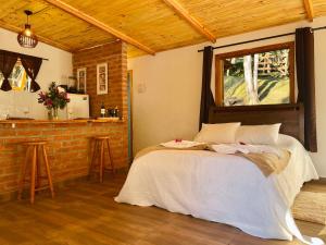 Chalé com lareira pertinho de Monte Verde - Ubytování bez kategorie ve městě Camanducaia