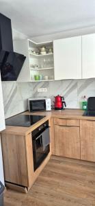 1 izbový pekný apartmán s neskorým odchodom až do 14 hodiny