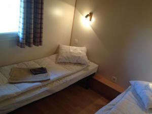 Campings Chalet avec Terrasse, 2 chambres, pour 6 pers. - API-1-52-609 : photos des chambres