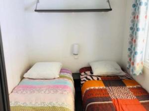 Campings Mobil home avec terrasse pour 6 personnes - API-1-52-397 : photos des chambres