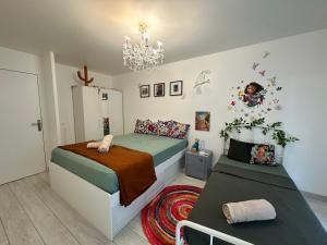 Appartements Cocon a deux pas de Disney avec terrasse : photos des chambres