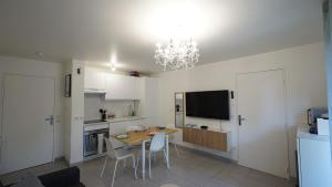 Appartements Cocon a deux pas de Disney avec terrasse : photos des chambres