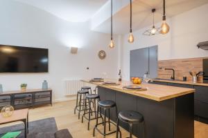 Appartements 110 m2 loft-style apartment : photos des chambres