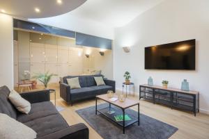 Appartements 110 m2 loft-style apartment : photos des chambres