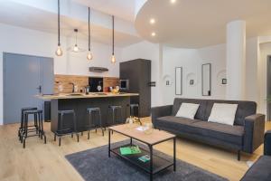 Appartements 110 m2 loft-style apartment : photos des chambres