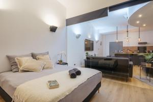 Appartements 110 m2 loft-style apartment : photos des chambres