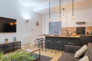Appartements 110 m2 loft-style apartment : photos des chambres