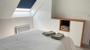 Residence des 3 iles, en plein centre-ville, a 5 min des plages, 3 appartements neufs : photos des chambres