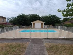 Appartements Le Parc! T3 climatise, Parking, Piscine : photos des chambres