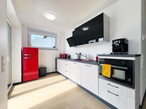 bonquartier - Design Apartment mit Balkon, Arbeitsplatz und Parkplatz