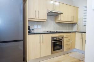 Bright, Airy 2BR with Private Patio, Fast WiFi, Family Friendly