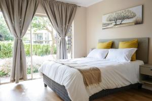 Bright, Airy 2BR with Private Patio, Fast WiFi, Family Friendly