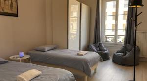 Appartements Chez Laurent Central - Climatise - Luxe : photos des chambres