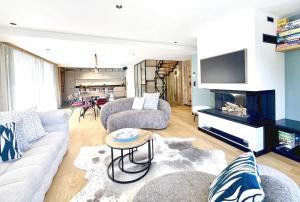 Maisons de vacances Prestigious ski chalet 900m Olympes gondolas : photos des chambres