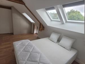 Maisons de vacances La Maison en Broceliande : photos des chambres