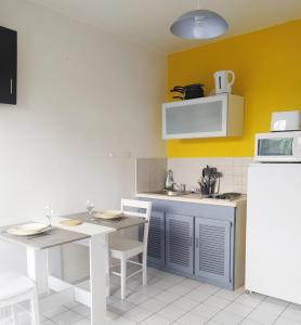 Appartements Cozy Studio Beaujolais - Porte de Lyon - Piscine&Tennis : photos des chambres