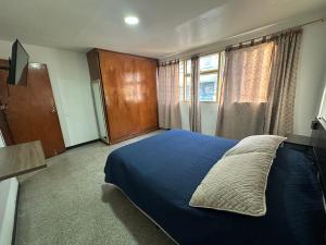 Apartamentos FM 208
