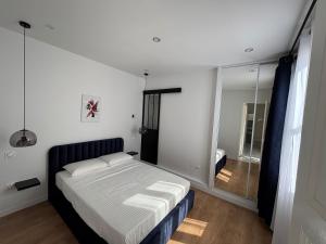 Appartements Luxe Capitol-Parking & Clim & Jacuzzi & Ascenseur : photos des chambres