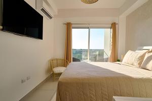 Caribbean Sunset Soak In Juan Dolio Beach Apt.