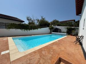 Maisons de vacances Belle maison 10 pers, piscine et jardin a Urrugne - FR-1-239-1146 : photos des chambres