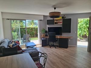 Appartements Lovely apartment with private garden and a swimming-pool : photos des chambres