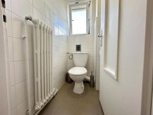Appartements M Lorry Frida cosy au rdc avec balcon proche Metz : photos des chambres