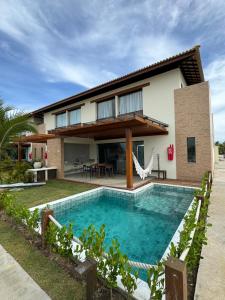 Condominio Frente Mar 3 suites com Ar Cond piscina e Hidro privativa