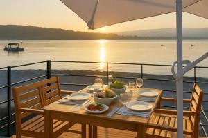 Yellow houseboat on Lake Maggiore