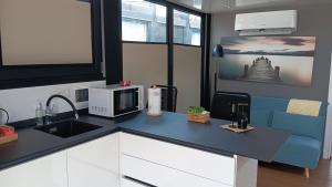 Yellow houseboat on Lake Maggiore