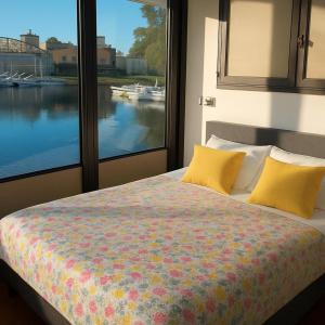 Yellow houseboat on Lake Maggiore